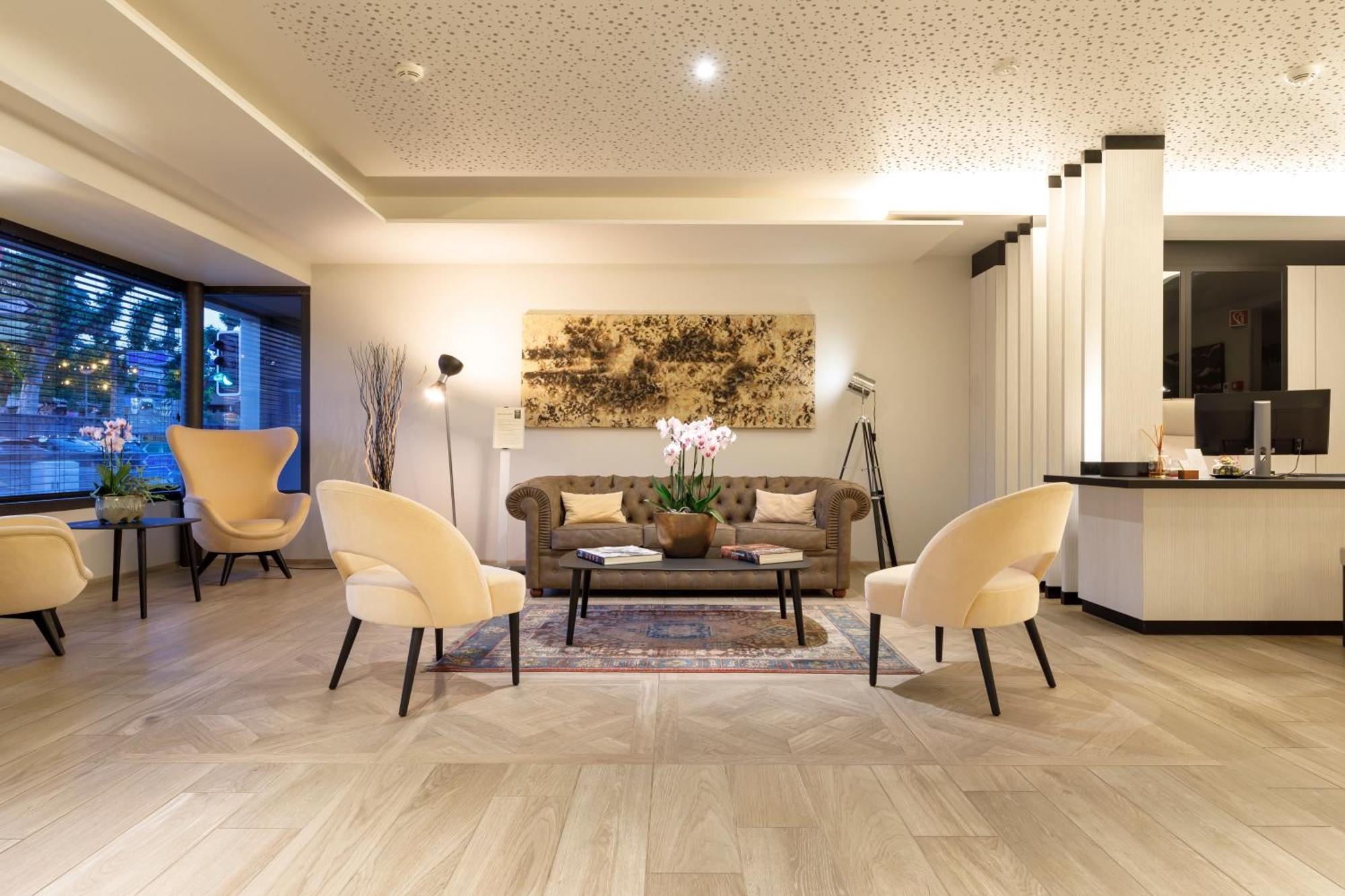 Ambassador Boutique Hotel Нион Екстериор снимка