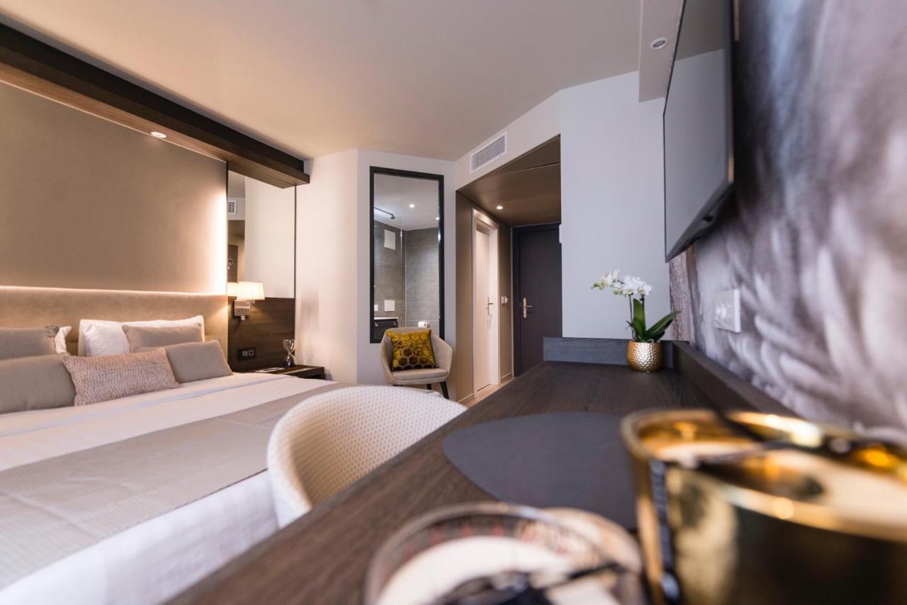 Ambassador Boutique Hotel Нион Екстериор снимка